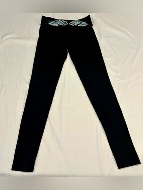 Victoria's Secret Black leggings with beautiful wings on back waist band.